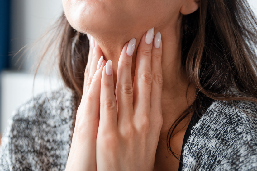 Young Woman Self Examination Thyroid Gland